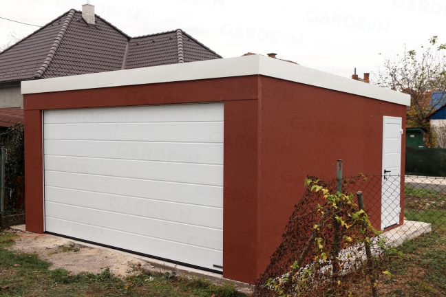 Montovaná jednogaráž s omietkou v tehlovej farbe