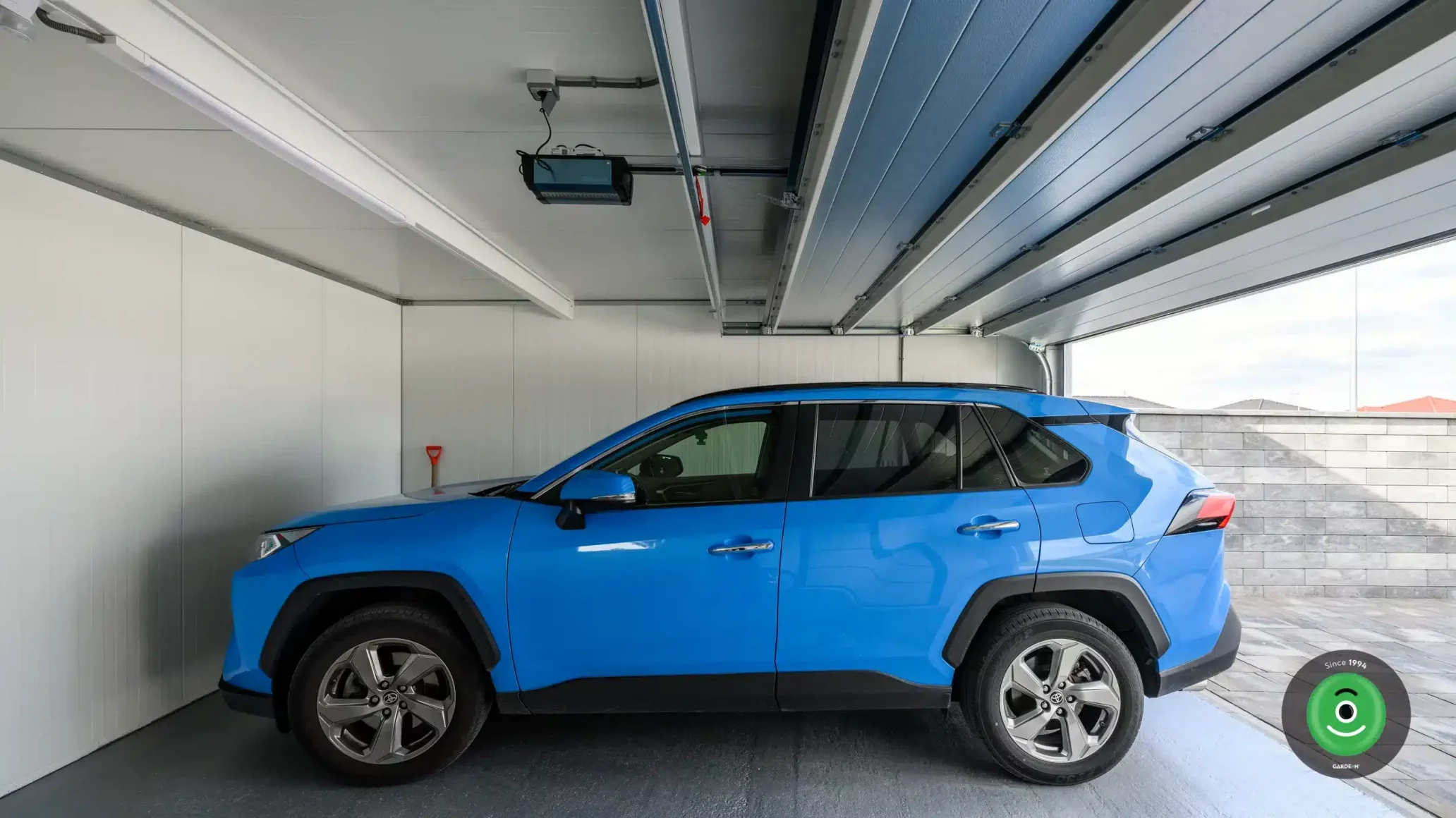 GARDEON garáž pre dve autá modré auto