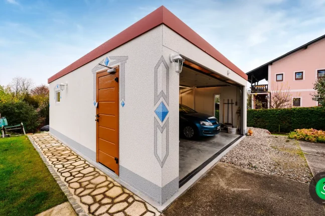 garáž pre dve autá s červeno hnedou atikou